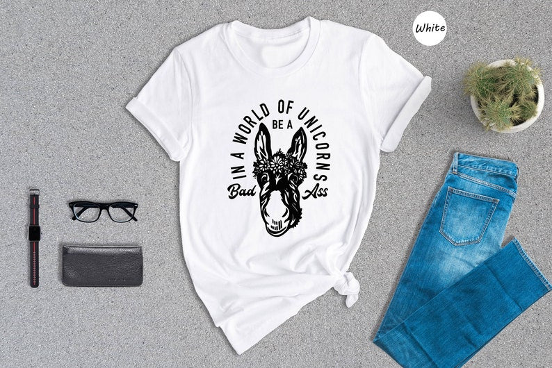 In a world of unicorns be a bad ass graphic tee