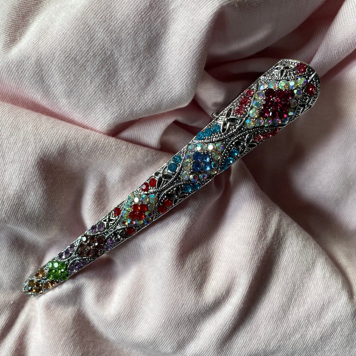 Pasador de pelo de diamantes de imitación plateado