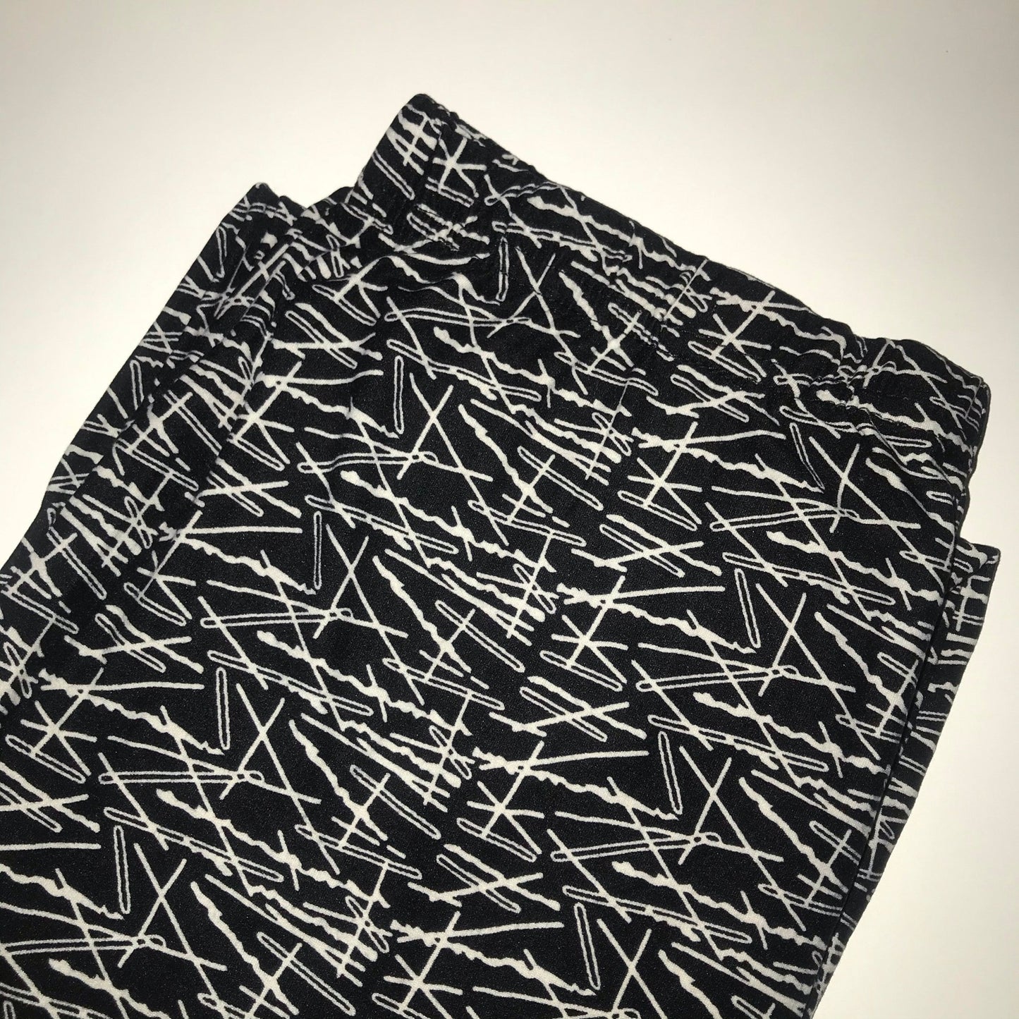 Leggings con clip de papel