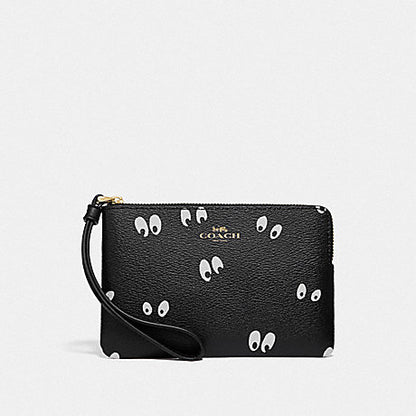 DISNEY X COACH CORNER ZIP WRISTLET WITH SNOW WHITE AND THE SEVEN DWARFS EYES PRINT (COACH F73565)