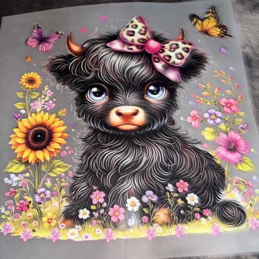 Black Cow with Bow in Feild of flowers and Butterflies Shirt Transfer